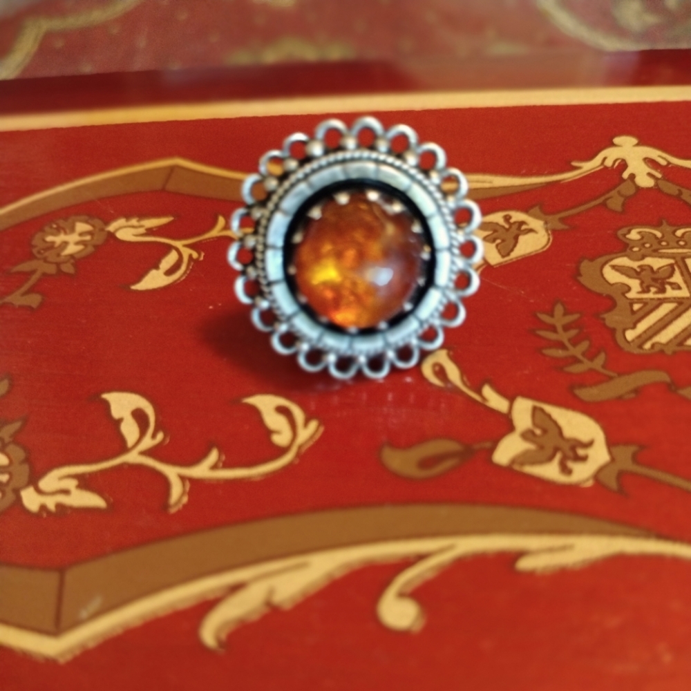 Antique sterling silver ring with amber